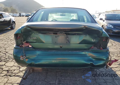 2000 Ford Focus Lx из США, поврежденный, VIN 1FAFP33P3YW215712